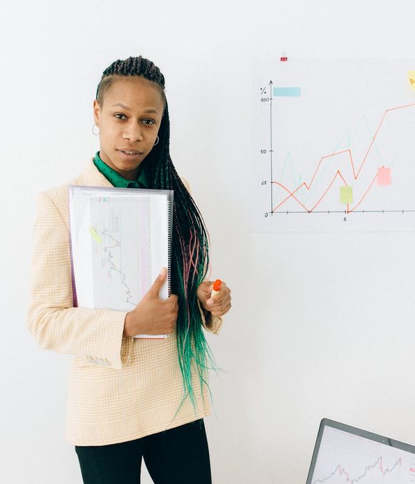 Professional data analysts examining stock market predictions